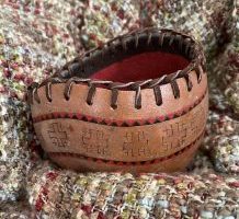 gourd with leather lacing