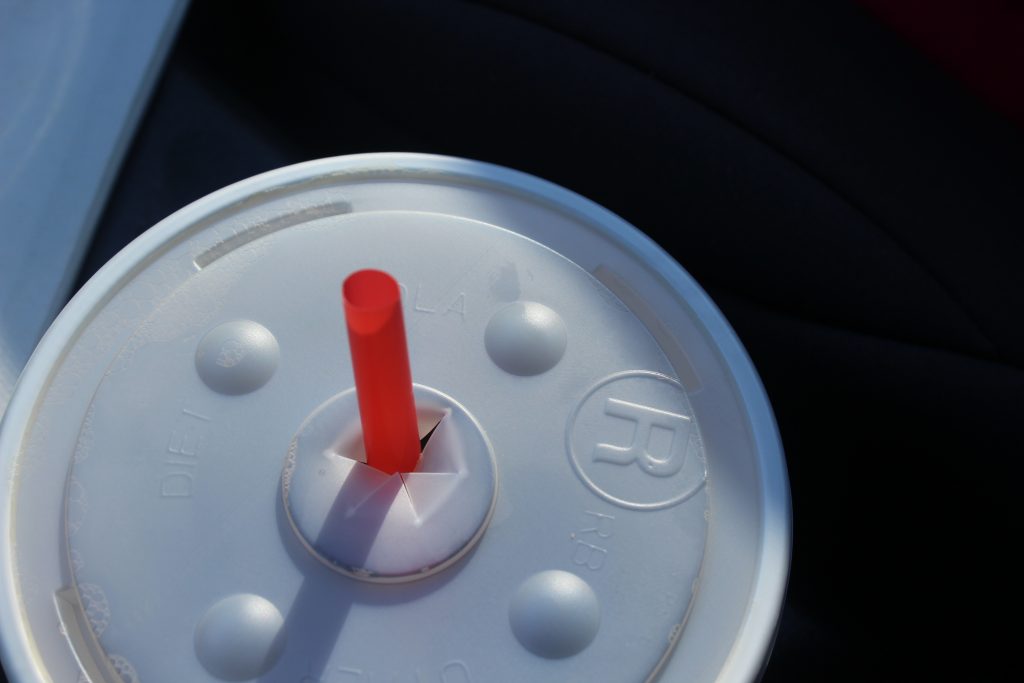 top of fountain drink with straw